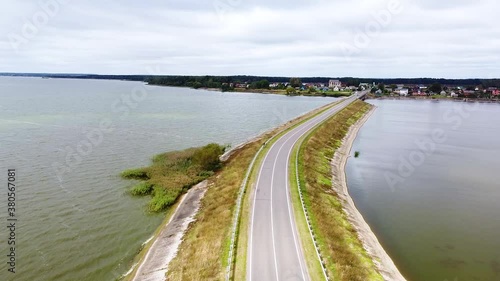 Wallpaper Mural Beautiful calm flight over a long road bridge by a dam across the sea Torontodigital.ca