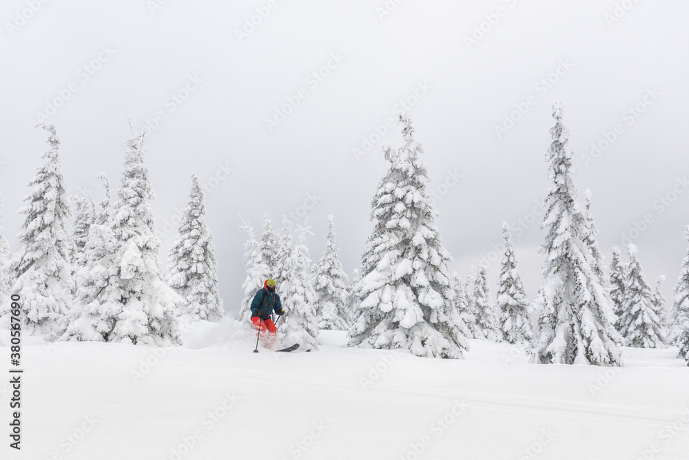 Man ski touring in the backcountry Man ski touring in the backcountry