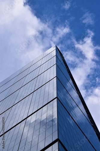 Corporate building and sky reflection detail