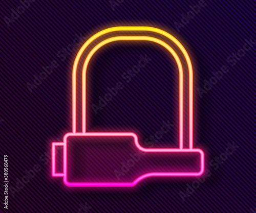 Glowing neon line Bicycle lock U shaped industrial icon isolated on black background. Vector Illustration.