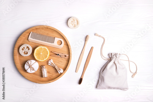 Set of eco natural bathroom accessories on white background.