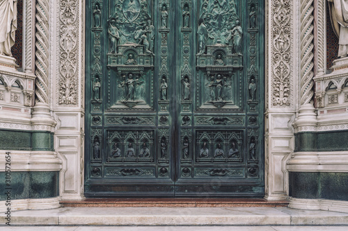 View of beautifully carved sculptures in stone doors photo