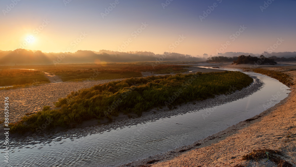 Sunrise and foggy morning on the Maye river. Bay of Somme