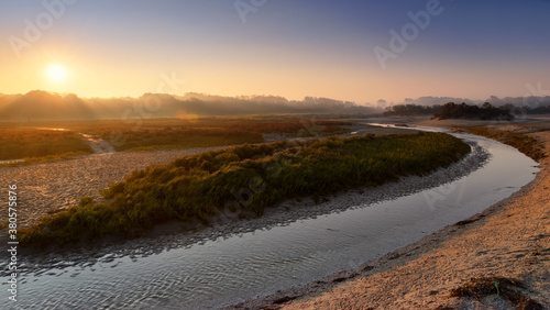 Sunrise and foggy morning on the Maye river. Bay of Somme