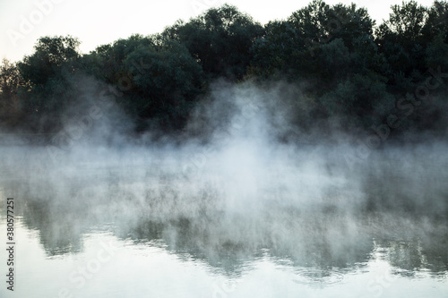 morning evaporation of water over the river, fog over the water