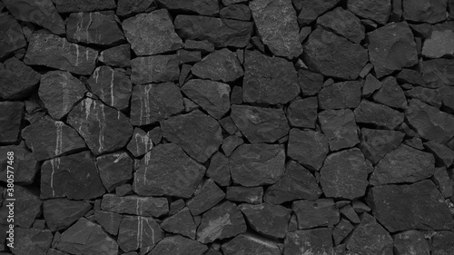 A wall of stones at the beach