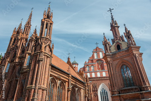 Facade of Roman Catholic St. Anne Church in Vilnius Old Town (lit. Church of the Holy Onos), Lithuania. UNESCO world heritage site, 15-th century. photo