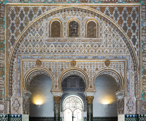 Moorish palace with carved stone wall photo