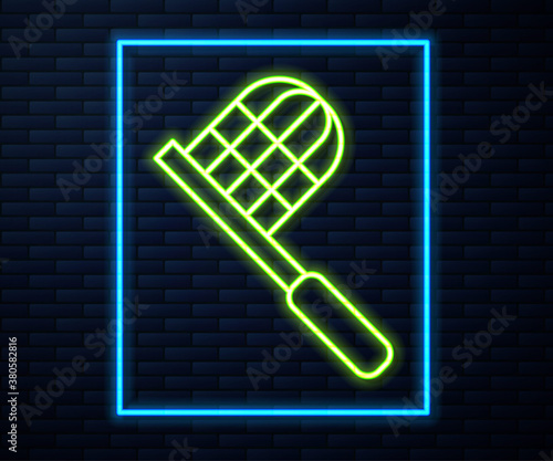 Glowing neon line Butterfly net icon isolated on brick wall background. Vector.