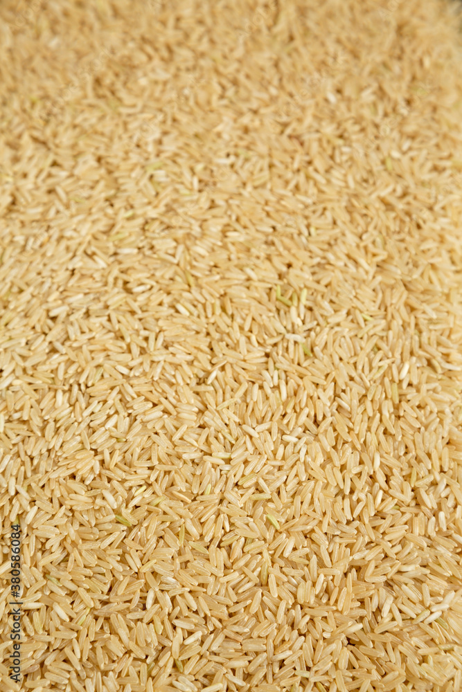 Dry Brown Rice background, side view. Dry Brown Rice background, side view.