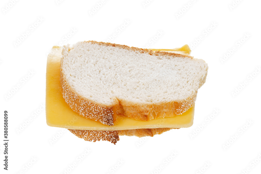 Sliced cheese between two sliced bread isolated on white background