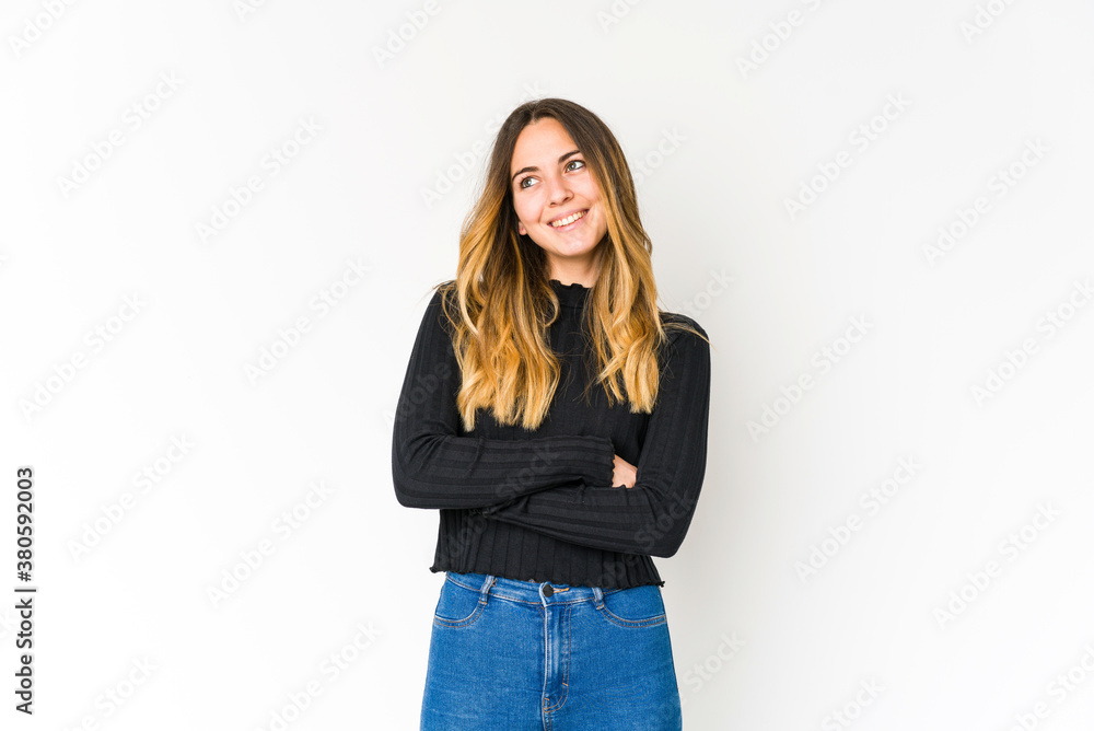 Young caucasian woman isolated on white background smiling confident with crossed arms. Young caucasian woman isolated on white background smiling confident with crossed arms.
