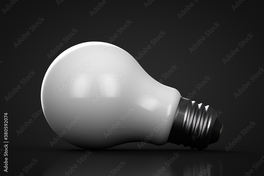 Energy saving lamp on the table close up. Energy saving lamp on the table close up.