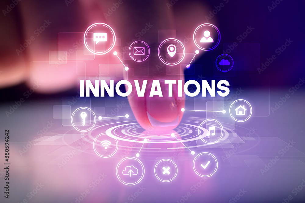 Finger touching tablet with web technology icons and INNOVATIONS inscription, web technology concept Finger touching tablet with web technology icons and INNOVATIONS inscription, web technology concept