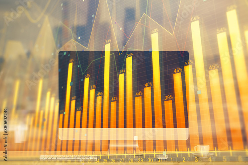 Stock market chart hologram drawn on personal computer background. Multi exposure. Concept of investment.