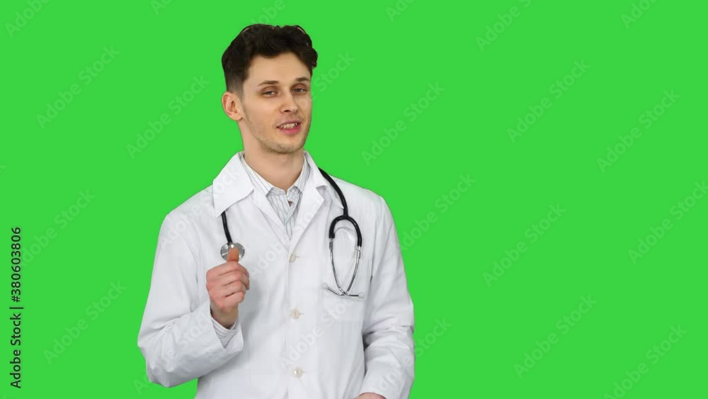 Orthopedist talking to camera and dancing after Everything will be fine on a Green Screen, Chroma Key. Orthopedist talking to camera and dancing after Everything will be fine on a Green Screen, Chroma Key.