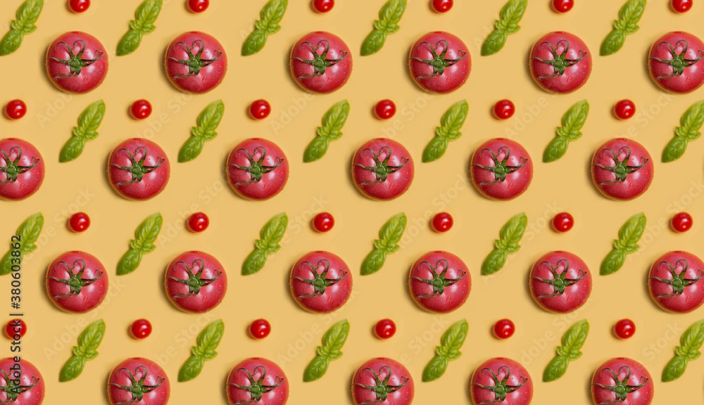 Tomato pattern on yellow background. Basil and pink tomato Tomato pattern on yellow background. Basil and pink tomato