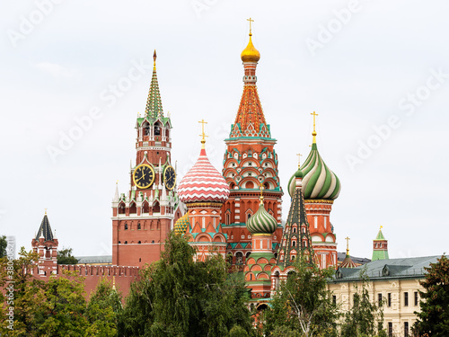 view of Pokrovsky Cathedral and Spasskaya Tower of Moscow Kremlin from Zaryadye park in Moscow city in September