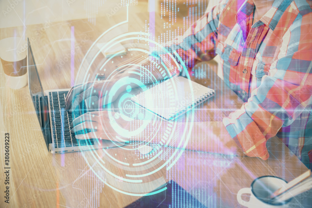 Businessman with computer background with technology theme hologram. Concept of big data. Double exposure.