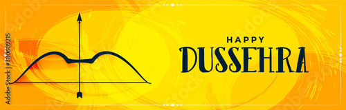 happy dussehra yellow banner with bow and arrow