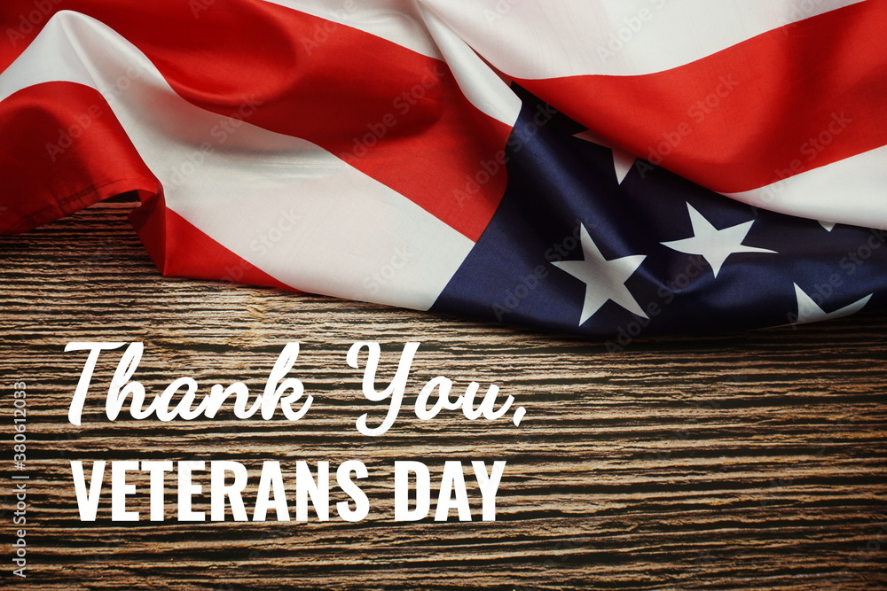 Thank You, Veterans text messege and USA flag. American holiday background Thank You, Veterans text messege and USA flag. American holiday background