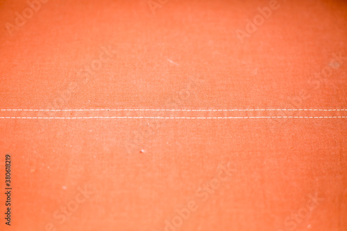 Closeup of orange textured background © Johny
