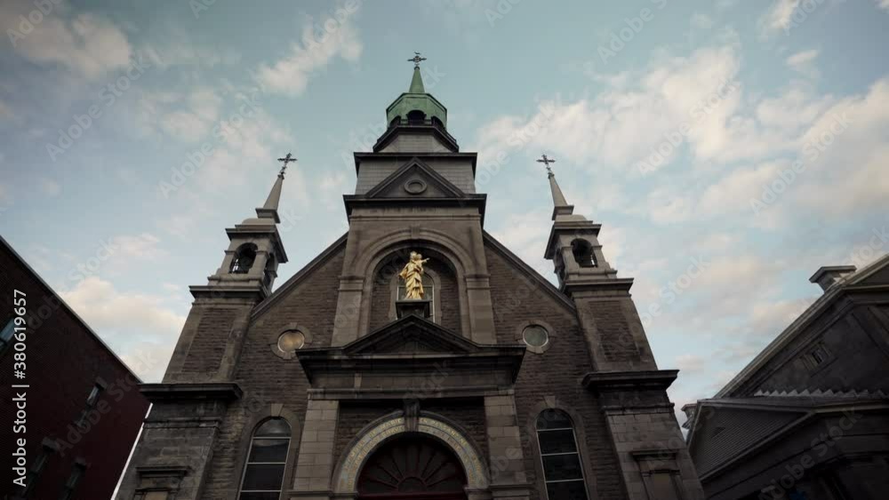 Our Lady of Good Help Church - Notre-Dame-de-Bon-Secours Chapel Against The Blue Sky During The World Pandemic Coronavirus Outbreak In Old Montreal Quebec, Canada. - low angle - parallax Our Lady of Good Help Church - Notre-Dame-de-Bon-Secours Chapel Against The Blue Sky During The World Pandemic Coronavirus Outbreak In Old Montreal Quebec, Canada. - low angle - parallax