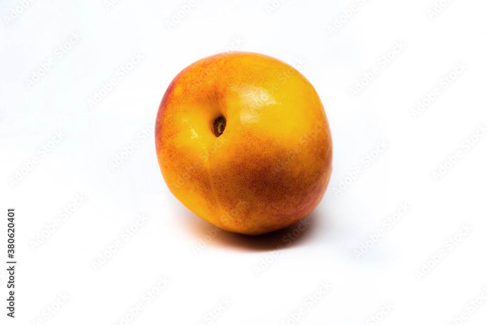 Beautiful nectarine of yellow color on white isolated background