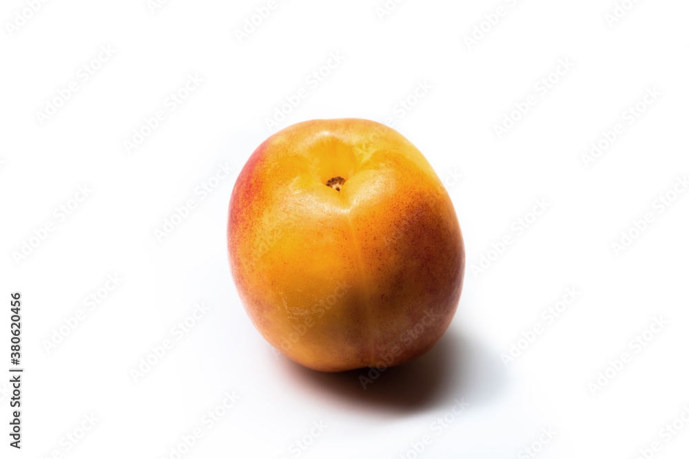 Beautiful nectarine of yellow color on white isolated background Beautiful nectarine of yellow color on white isolated background