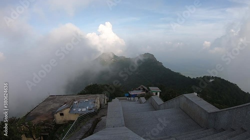Time lapse of clouds floating in the valley of Parasnath Ranges in Jharkhand, India. photo