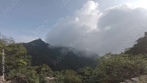 Time lapse of clouds floating in the valley of Parasnath Ranges in Jharkhand, India. photo