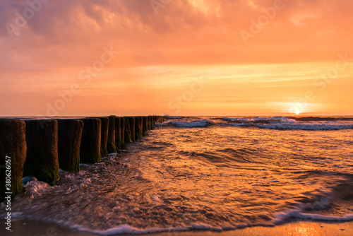 Romantic sunrise above the ocean