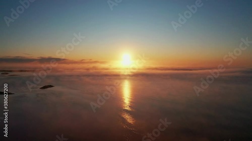Wallpaper Mural Drone Flying Towards The Golden Sun Over The Foggy Lake In South Iceland. - aerial drone shot Torontodigital.ca