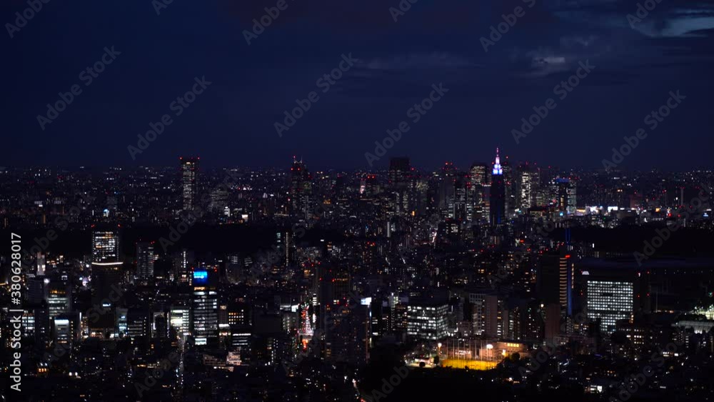High above panoramic view out on Shinjuku, Tokyo skyline at night in 4k with Shinjuku Tower High above panoramic view out on Shinjuku, Tokyo skyline at night in 4k with Shinjuku Tower