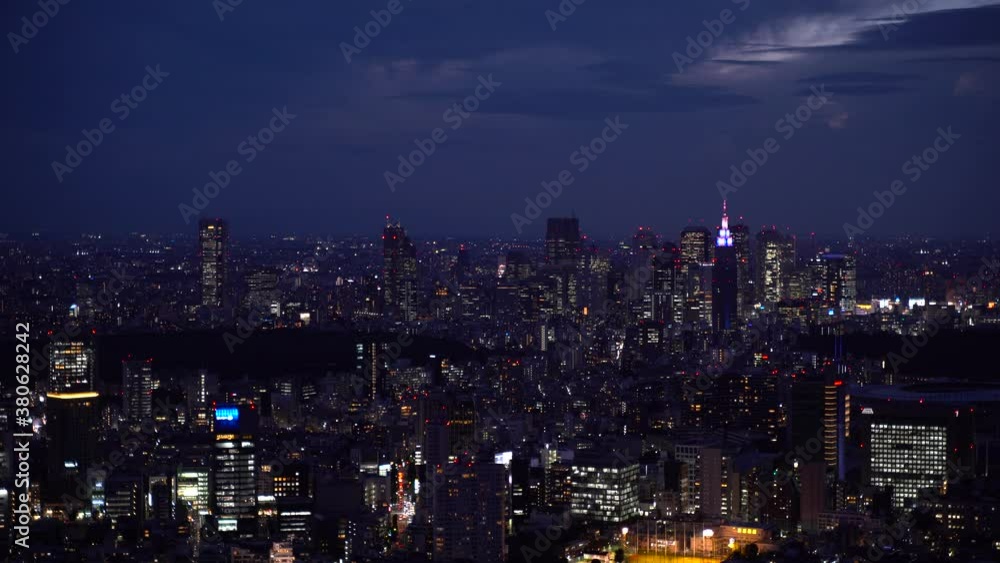 High above panoramic view out on Shinjuku, Tokyo skyline at night in 4k High above panoramic view out on Shinjuku, Tokyo skyline at night in 4k