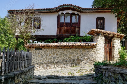 02_Old picturesque house from the Arichektur compex Varosha in Blagoevgrad, Bulgaria. Fully retained the authentic atmosphere of the Bulgarian national revival villages dating back more than two centu photo