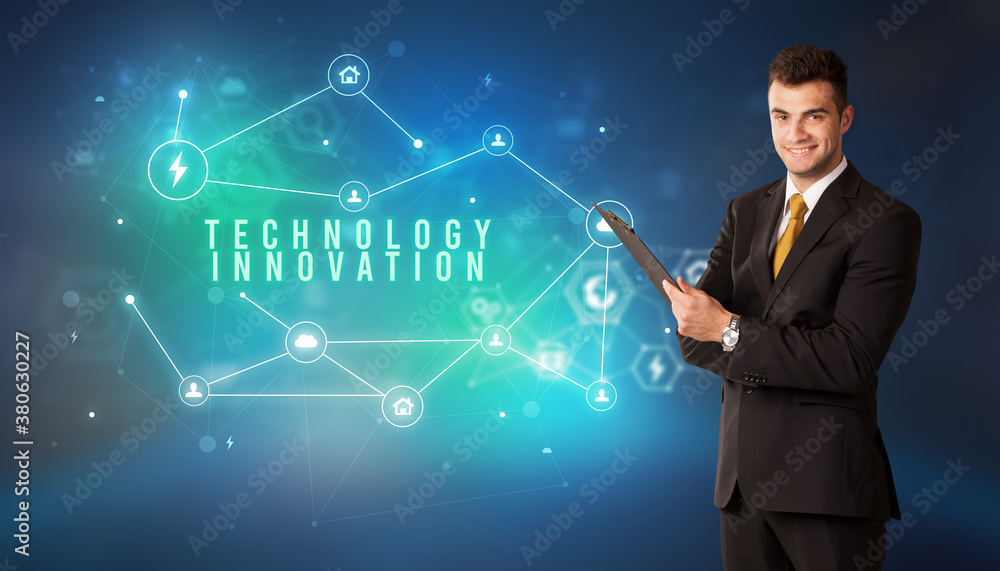 Businessman in front of cloud service icons with TECHNOLOGY INNOVATION inscription, modern technology concept Businessman in front of cloud service icons with TECHNOLOGY INNOVATION inscription, modern technology concept