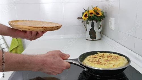 Preparation of Spanish omelette. Home cooking concept.