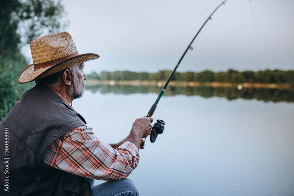senior man fishing on the lake