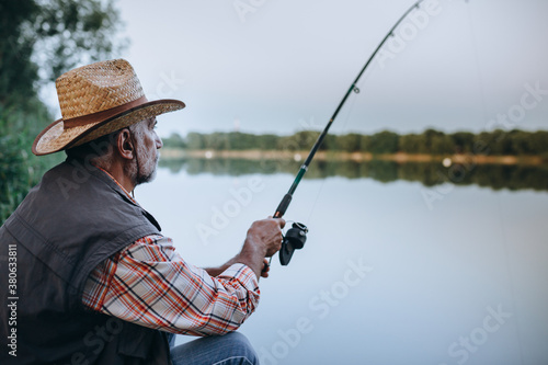 senior man fishing on the lake