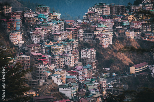 Shimla village high angle view at sunrise, houses at the foothills of the Himalayas, Himachal Pradesh