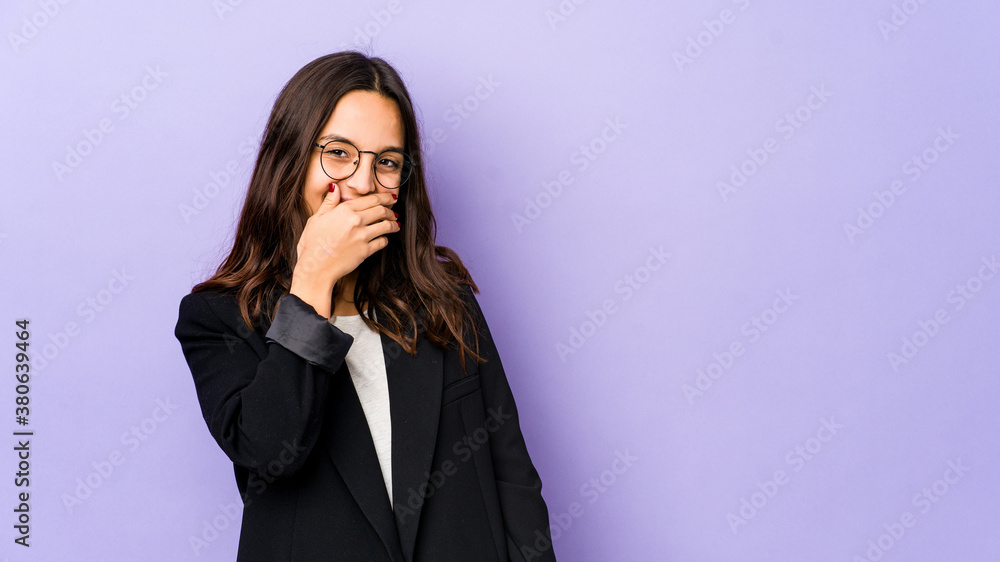 Young mixed race hispanic woman isolated laughing happy, carefree, natural emotion. Young mixed race hispanic woman isolated laughing happy, carefree, natural emotion.