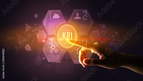 Hand touching KPI inscription, new technology concept