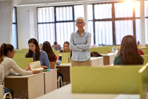 Female professor posing for a photo in the classroom