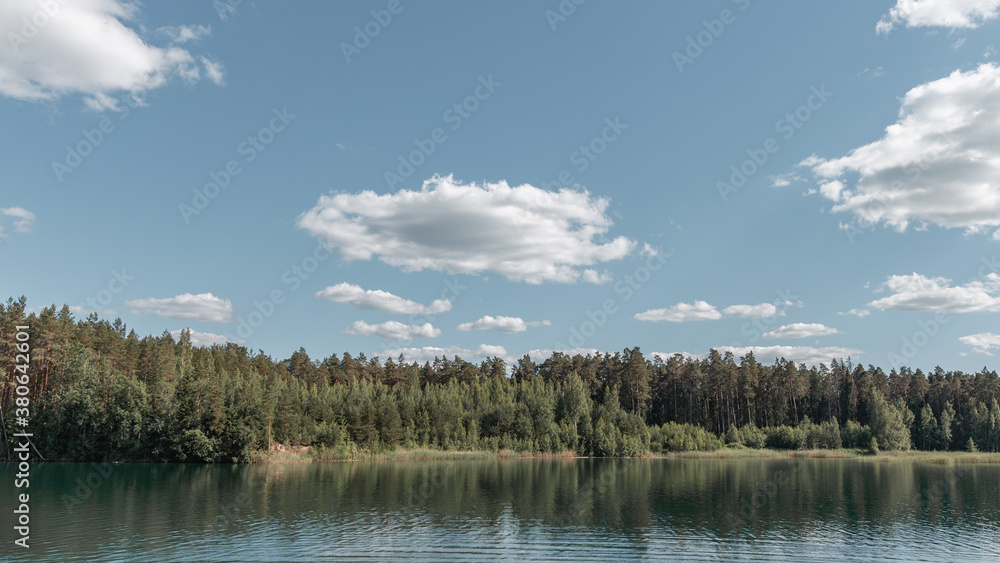 Fototapeta premium clouds over lake