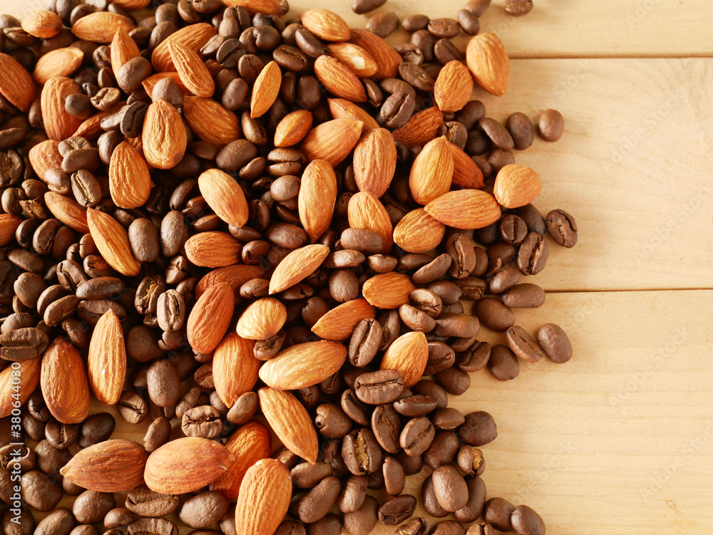 mixed almond and coffee background mixed almond and coffee background