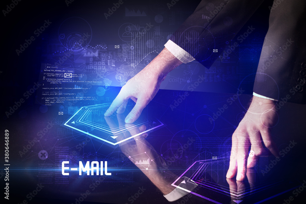Hand touching digital table with E-MAIL inscription, new age security concept Hand touching digital table with E-MAIL inscription, new age security concept