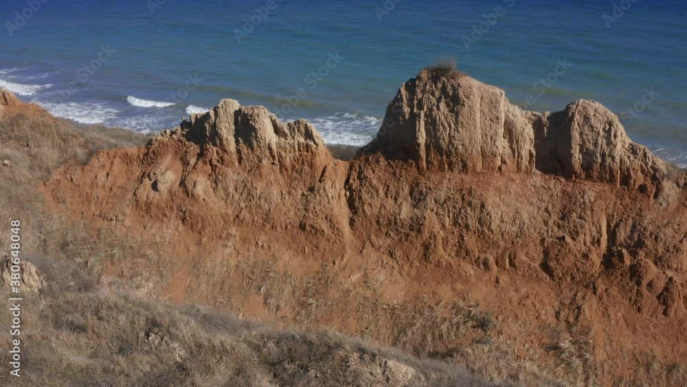 Landslide zone. Ruined shore, beach, danger spot. Part of the coastline on the Black Sea coast near Odessa, Ukraine. Landslide zone. Ruined shore, beach, danger spot. Part of the coastline on the Black Sea coast near Odessa, Ukraine.