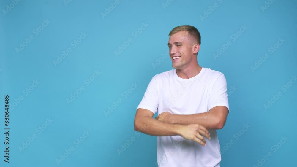 Young caucasian man smiling confident with crossed arms Young caucasian man smiling confident with crossed arms