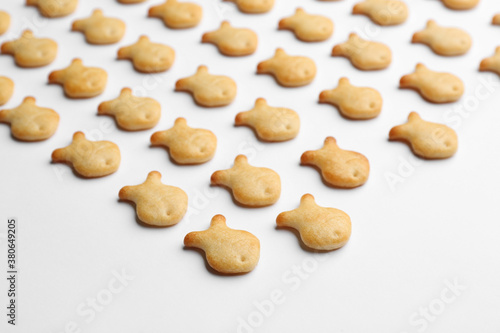 Delicious goldfish crackers on white background, closeup